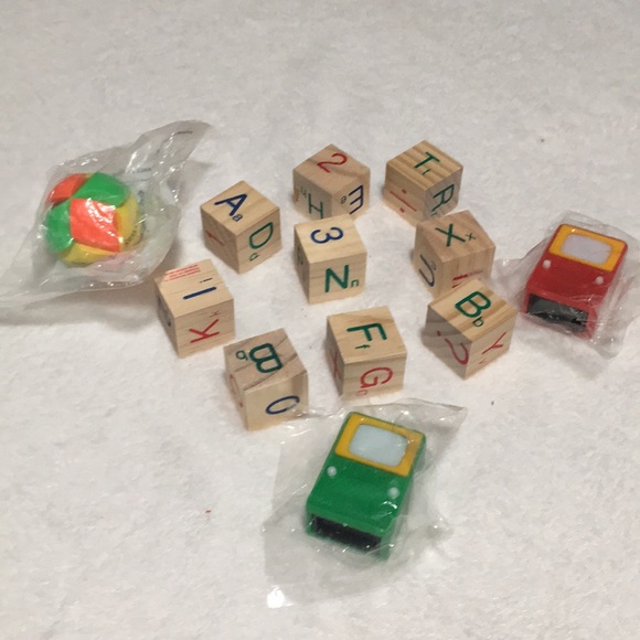Wooden blocks and individually wrapped plastic toys and game - Picture 1 of 6